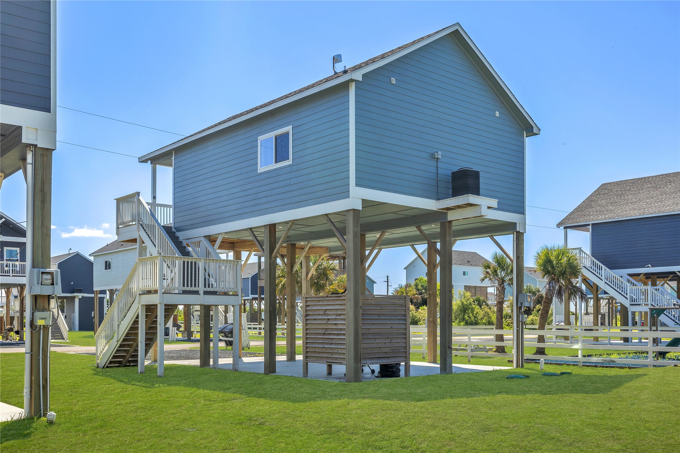 1079 Cedar Lane Port Bolivar, TX 77650 - Photo 15 of 39 front view of house with a yard