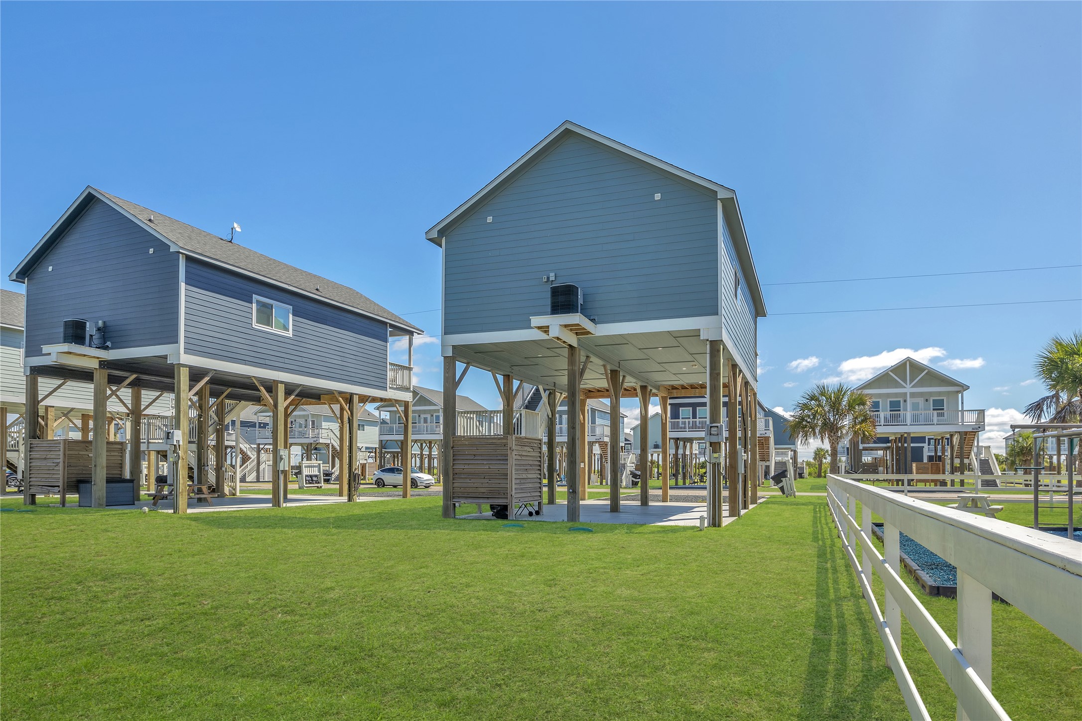 1079 Cedar Lane Port Bolivar, TX 77650 - Photo 16 of 39 a view of a building with a yard