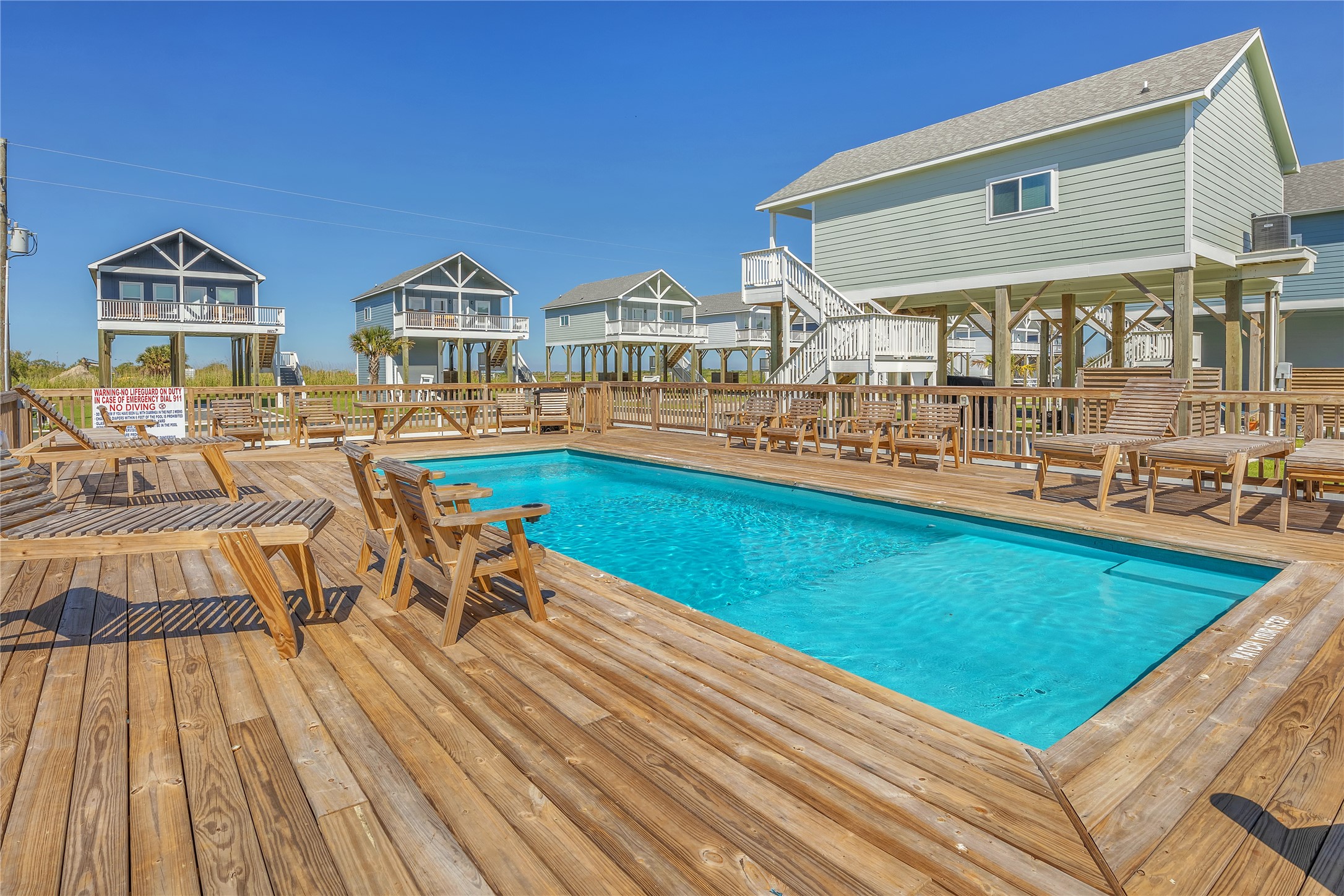 1079 Cedar Lane Port Bolivar, TX 77650 - Photo 18 of 39 a view of swimming pool with outdoor seating