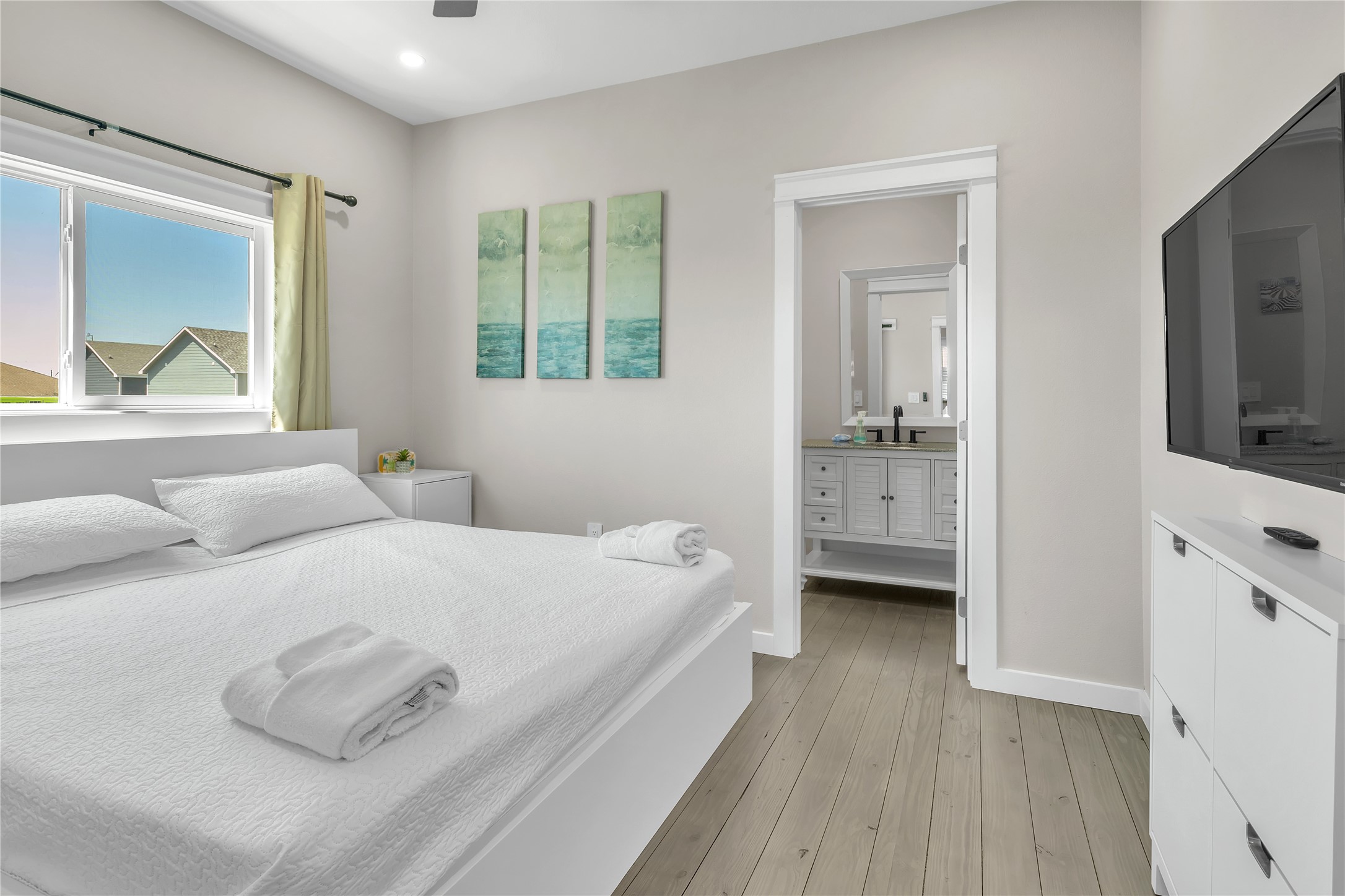 1079 Cedar Lane Port Bolivar, TX 77650 - Photo 25 of 39 a bedroom with a bed and a view of living room