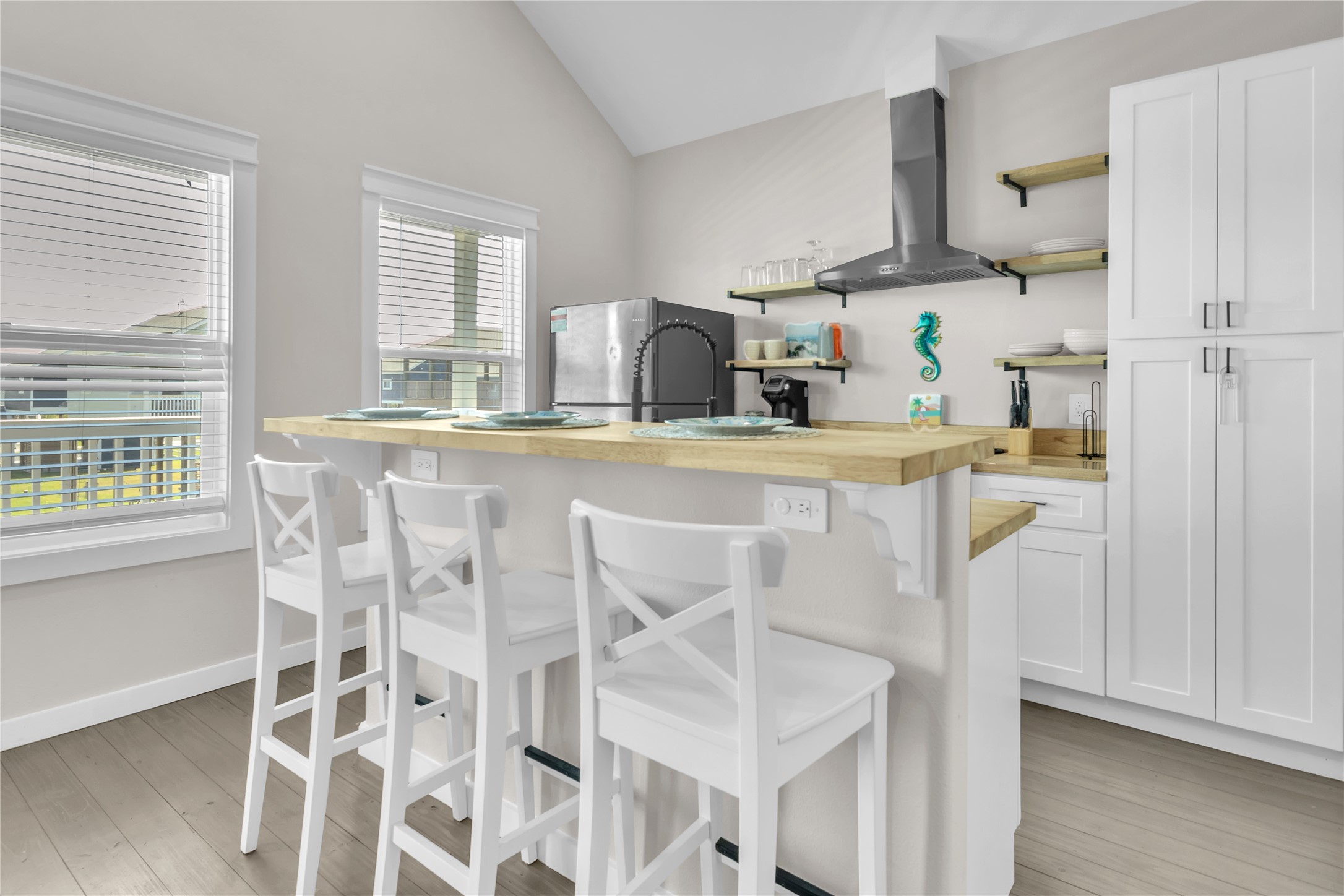 1079 Cedar Lane Port Bolivar, TX 77650 - Photo 29 of 39 a kitchen with cabinets and chairs