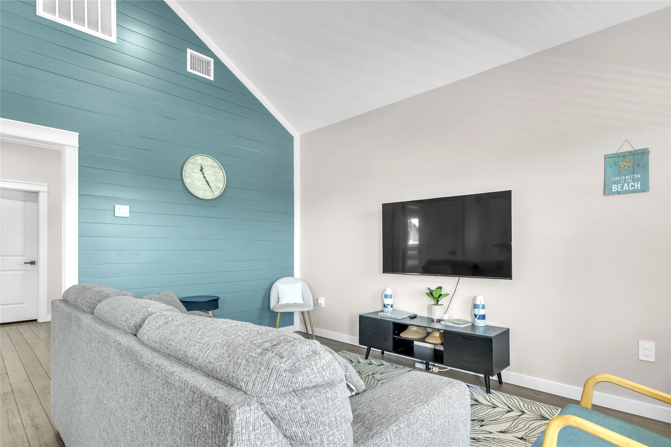 1079 Cedar Lane Port Bolivar, TX 77650 - Photo 36 of 39 a living room with furniture and a flat screen tv