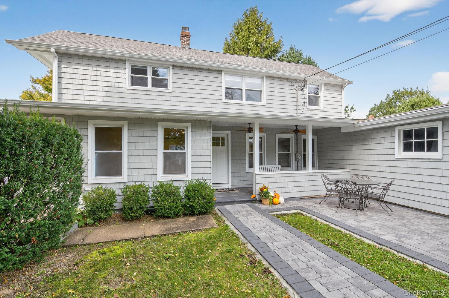 20 Locust Place Locust Valley, NY 11560 - Photo 3 of 16 a house view with a seating space