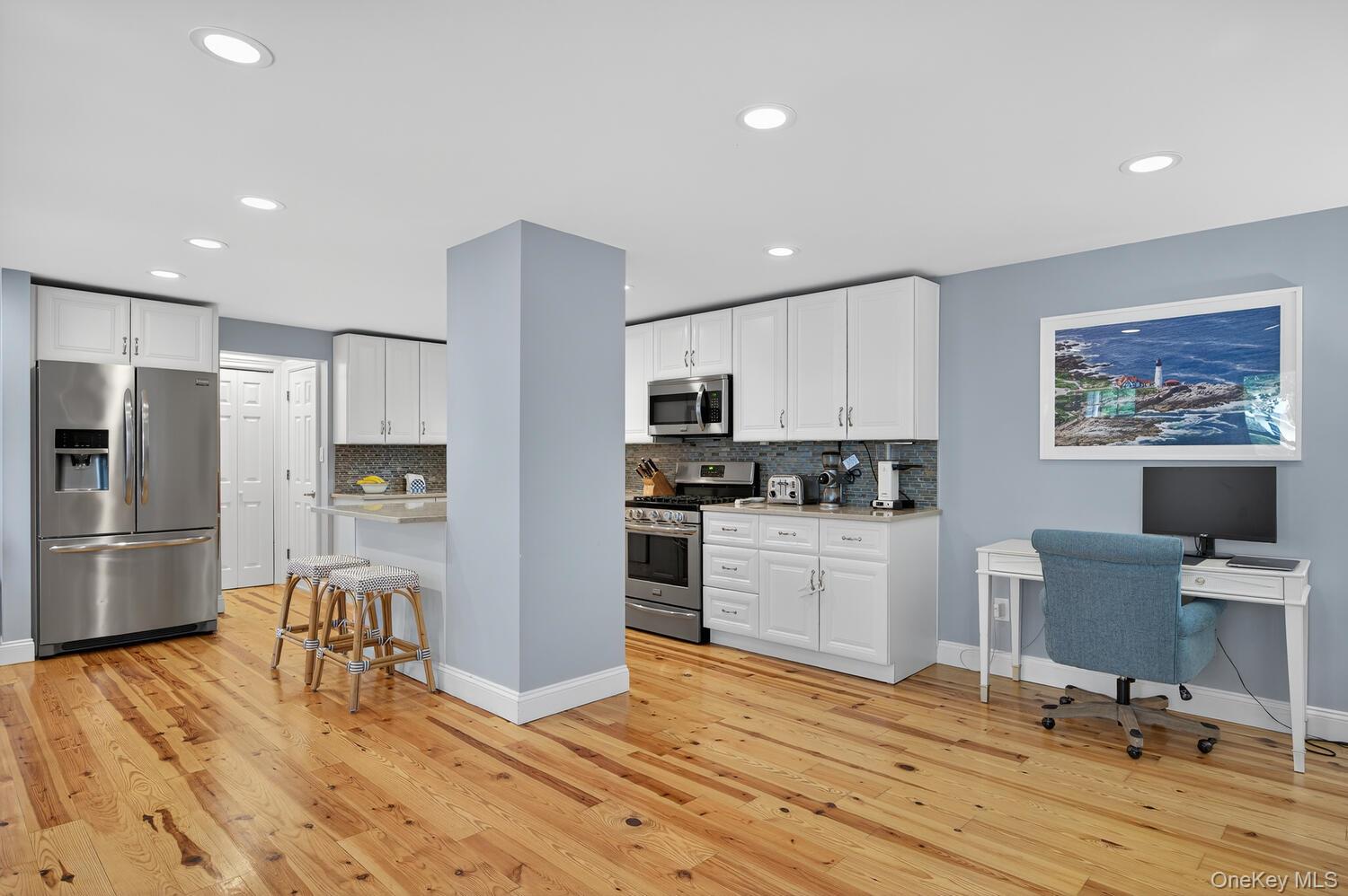 20 Locust Place Locust Valley, NY 11560 - Photo 6 of 16 a kitchen with granite countertop a refrigerator and a stove top oven
