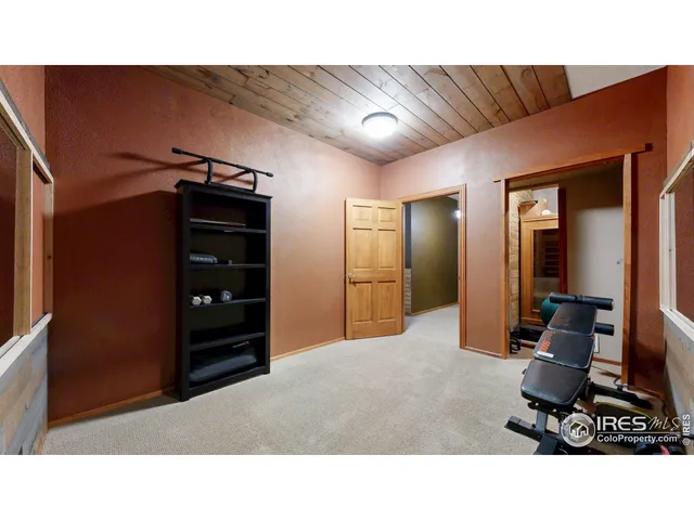a room with furniture and air hockey table
