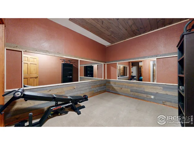 a kitchen with a table and chairs