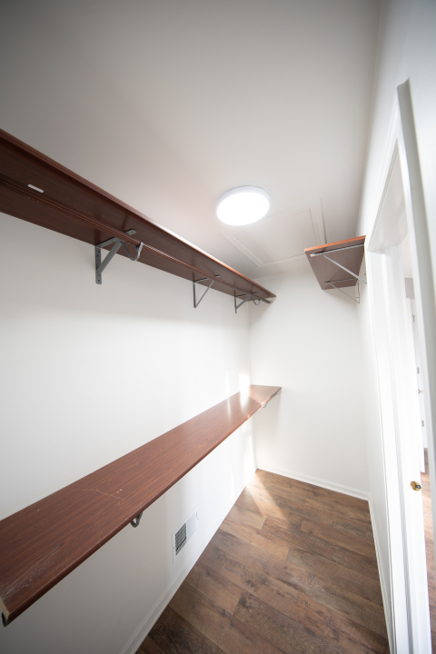 1303 Bridgehampton Drive Plainfield, IL 60586 - Photo 15 of 29 a view of a room with wooden floor