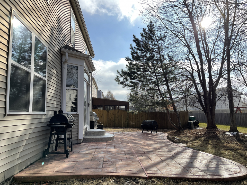 1303 Bridgehampton Drive Plainfield, IL 60586 - Photo 27 of 29 a view of a house with a yard