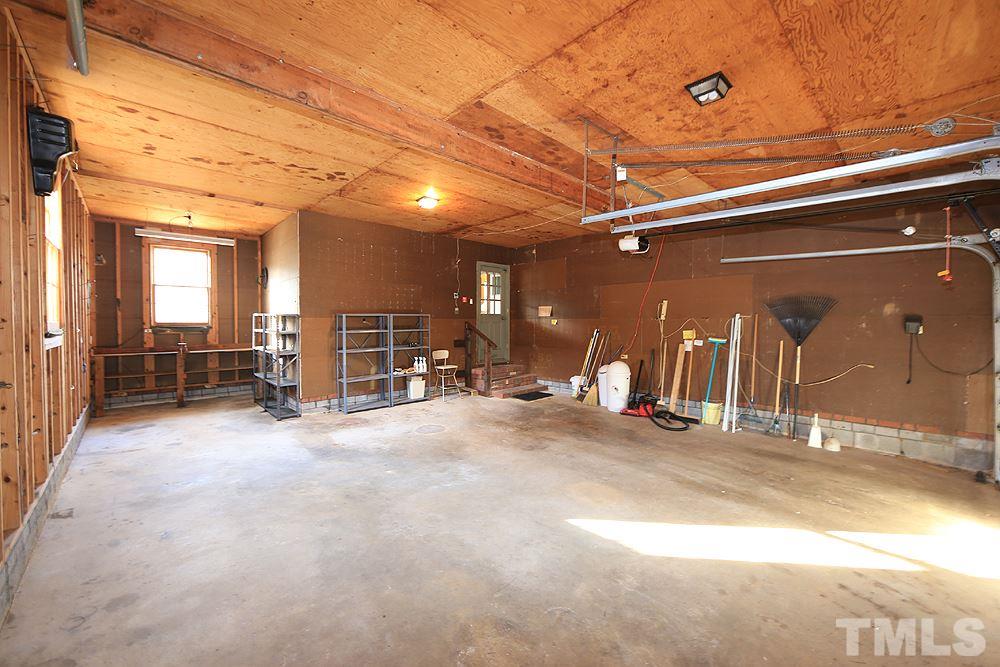 4316 Oak Park Road Raleigh, NC 27612 - Photo 11 of 30 a view of a hall with wooden floor
