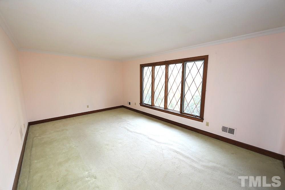 4316 Oak Park Road Raleigh, NC 27612 - Photo 4 of 30 an empty room with windows