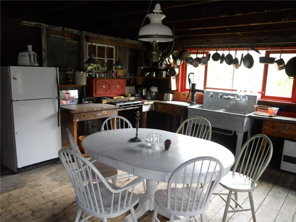 424 Pendleton Point Road Islesboro, ME 04848 - Photo 13 of 26 Kitchen-dining room