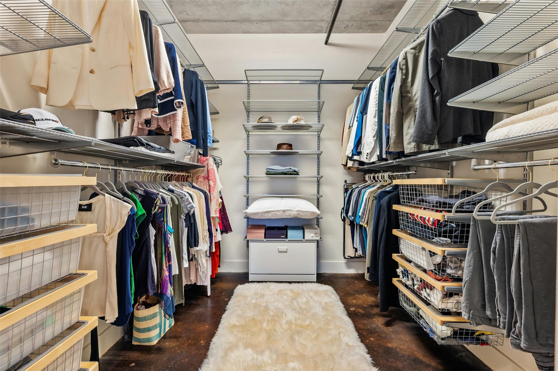 800 West 5th Street, Unit 1104 Austin, TX 78703 - Photo 18 of 31 a view of walk in closet with clothes and shoes