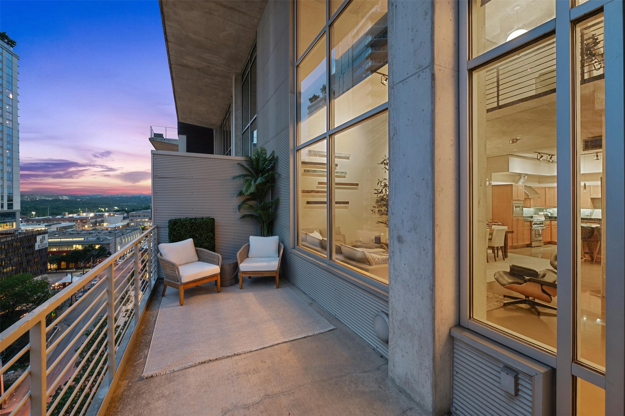 800 West 5th Street, Unit 1104 Austin, TX 78703 - Photo 25 of 31 a balcony with chairs and with view of living room