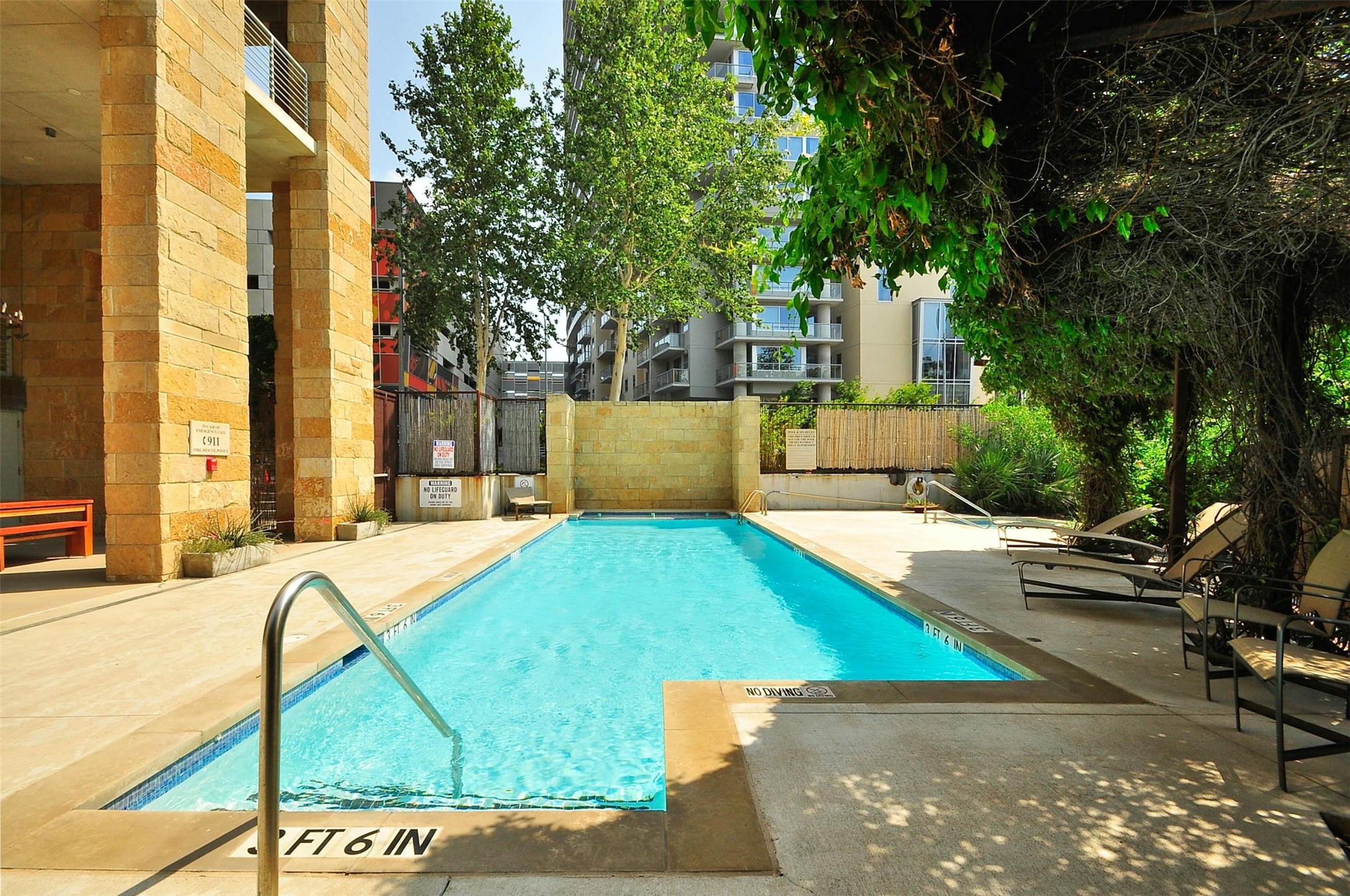 800 West 5th Street, Unit 1104 Austin, TX 78703 - Photo 27 of 31 a view of a backyard with a patio