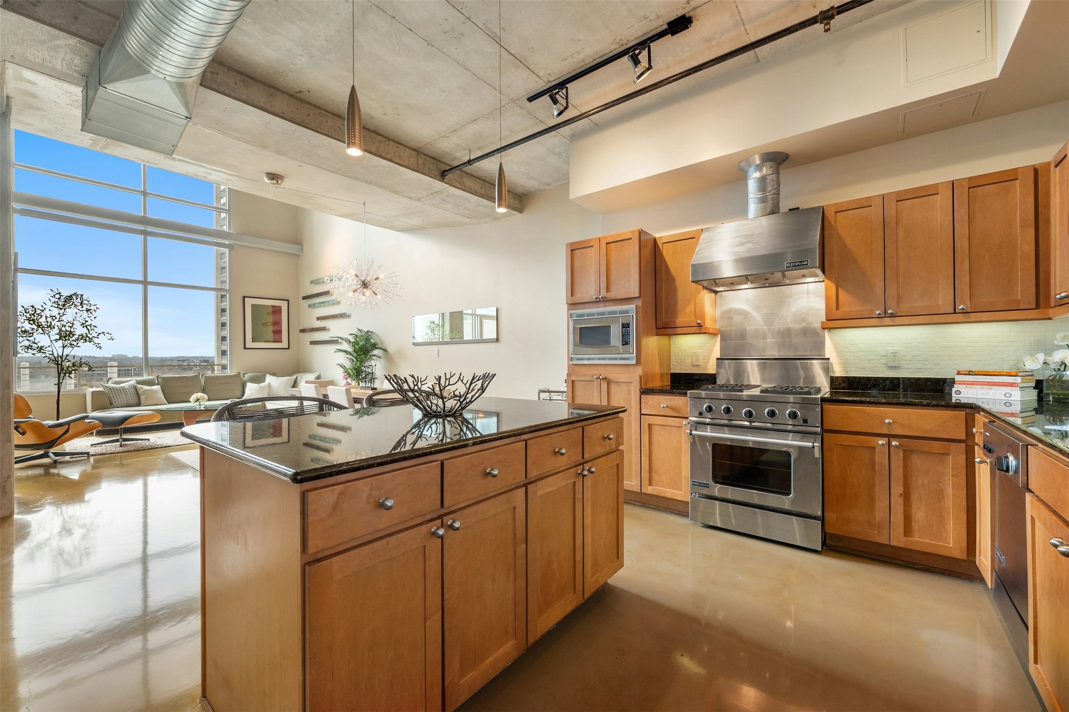 800 West 5th Street, Unit 1104 Austin, TX 78703 - Photo 4 of 31 a kitchen with stainless steel appliances granite countertop a sink and cabinets