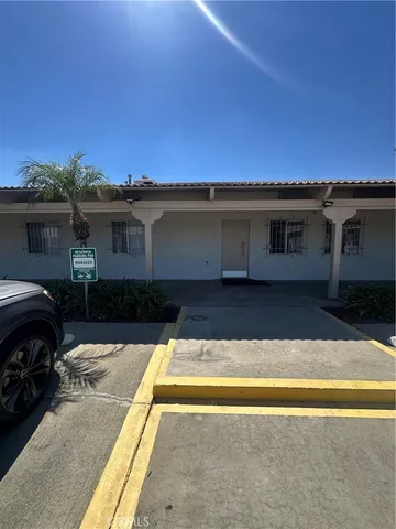 a view of swimming pool with outdoor seating