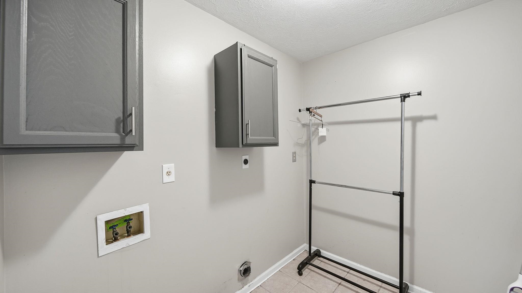 1785 Candle Ridge Drive Cordova, TN 38016 - Photo 21 of 39 a bathroom with a shower and a sink