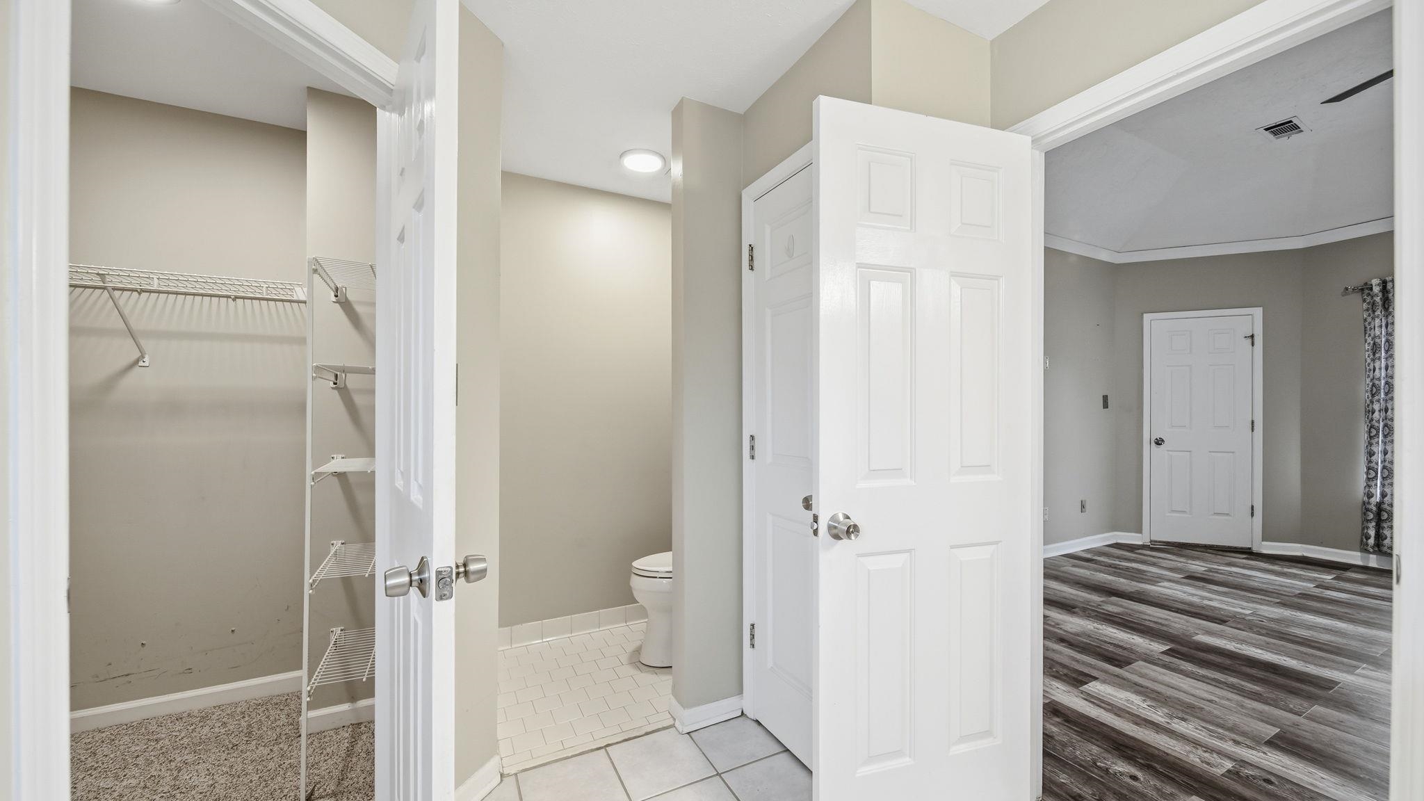 1785 Candle Ridge Drive Cordova, TN 38016 - Photo 27 of 39 Bathroom with a spacious closet and toilet