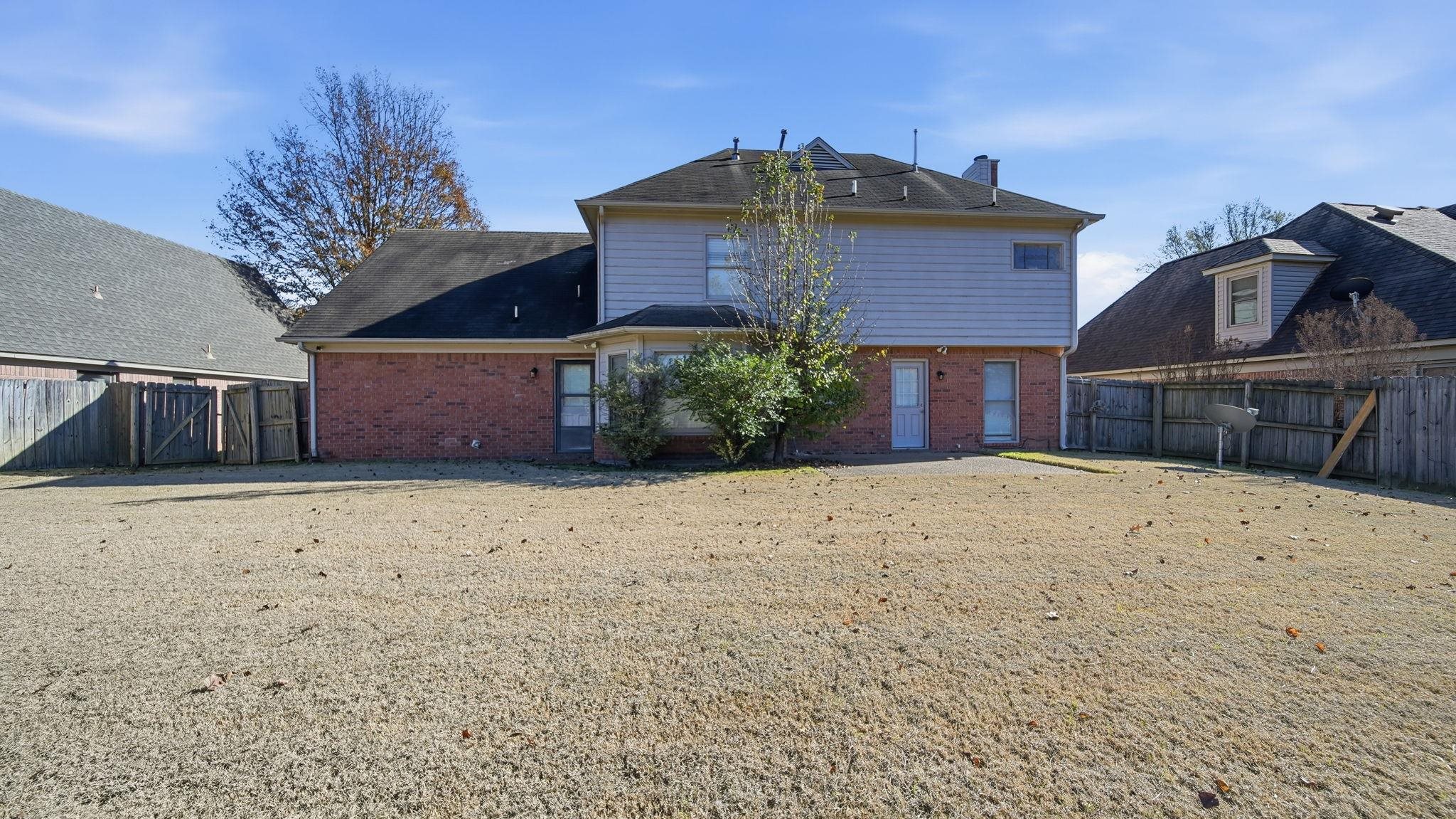 1785 Candle Ridge Drive Cordova, TN 38016 - Photo 38 of 39 a front view of a house with a yard