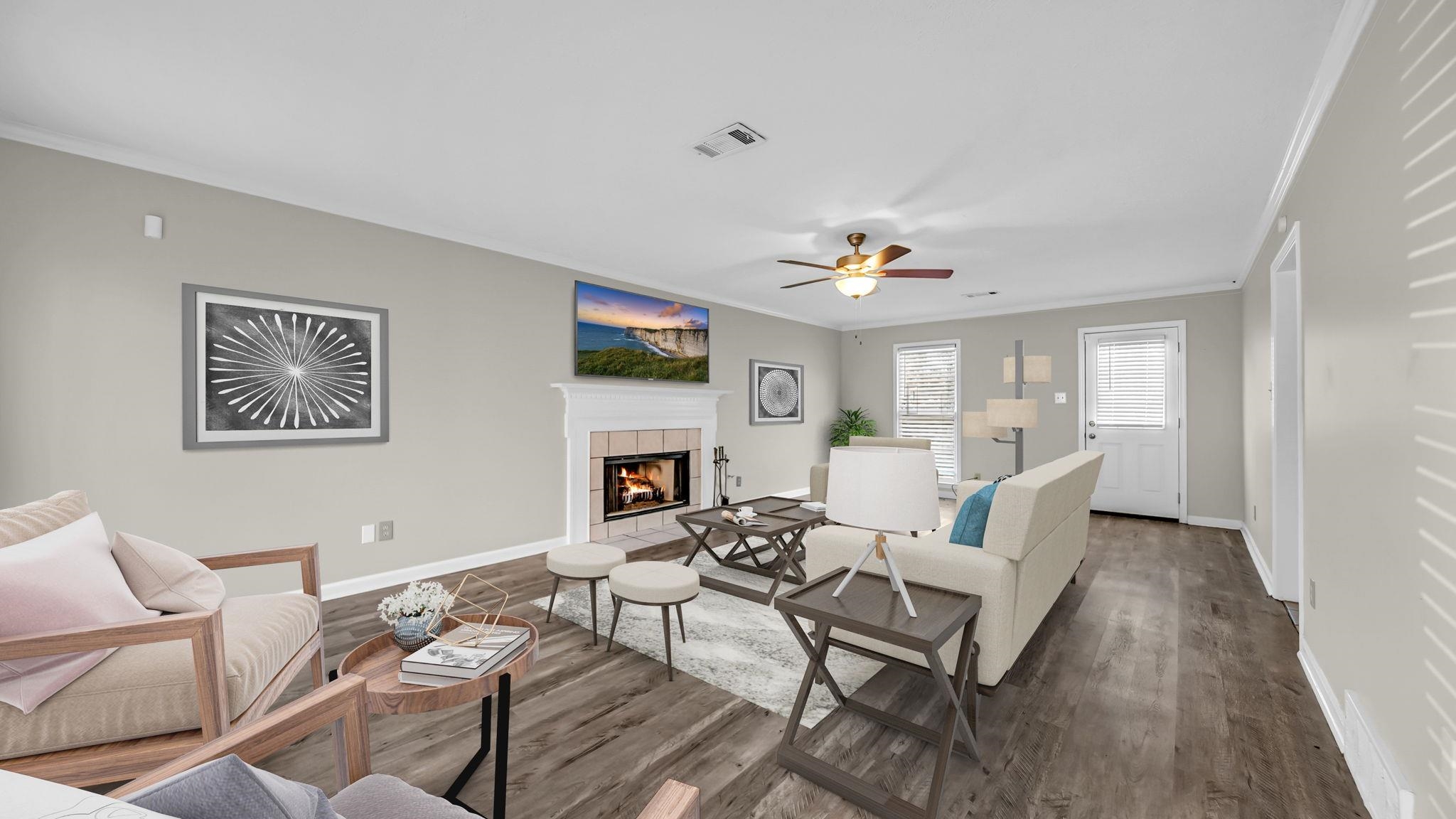 1785 Candle Ridge Drive Cordova, TN 38016 - Photo 6 of 40 a living room with furniture and a fireplace