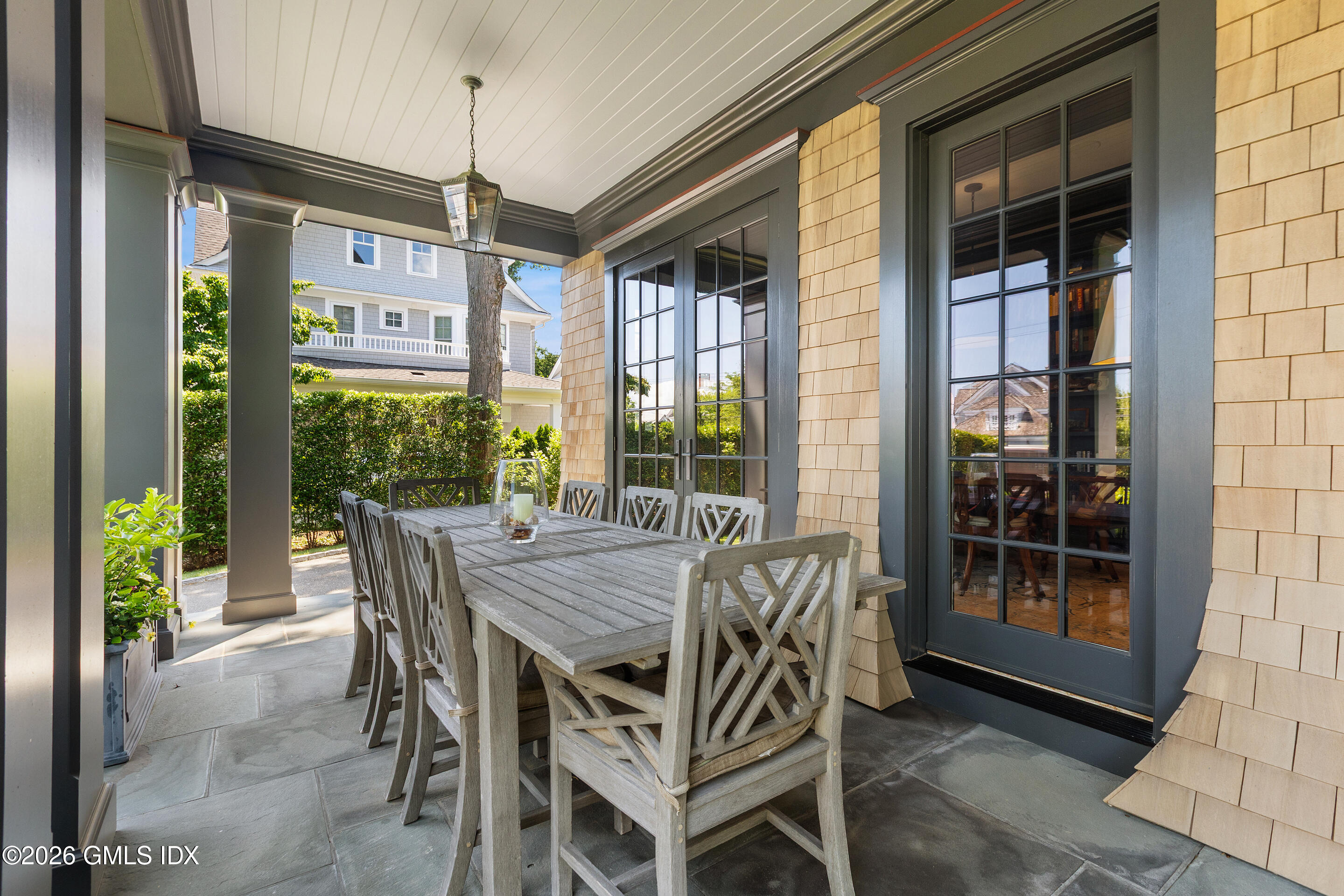 203 Shore Road Old Greenwich, CT 06870 - Photo 17 of 46 Covered Porch Dining