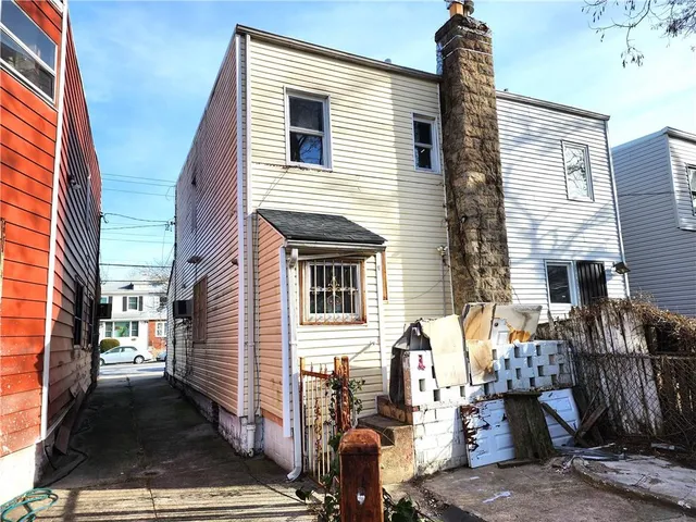 a view of parked car with city street