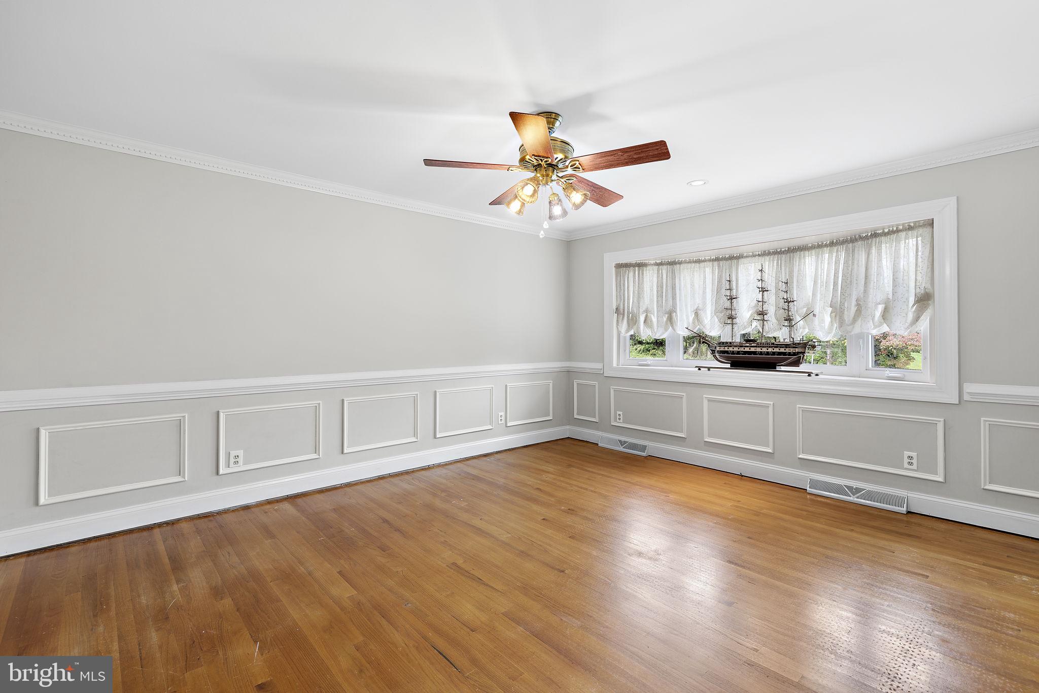 1404 Ryan Road Fallston, MD 21047 - Photo 6 of 50 Living room w/hardwood floors & ceiling fan