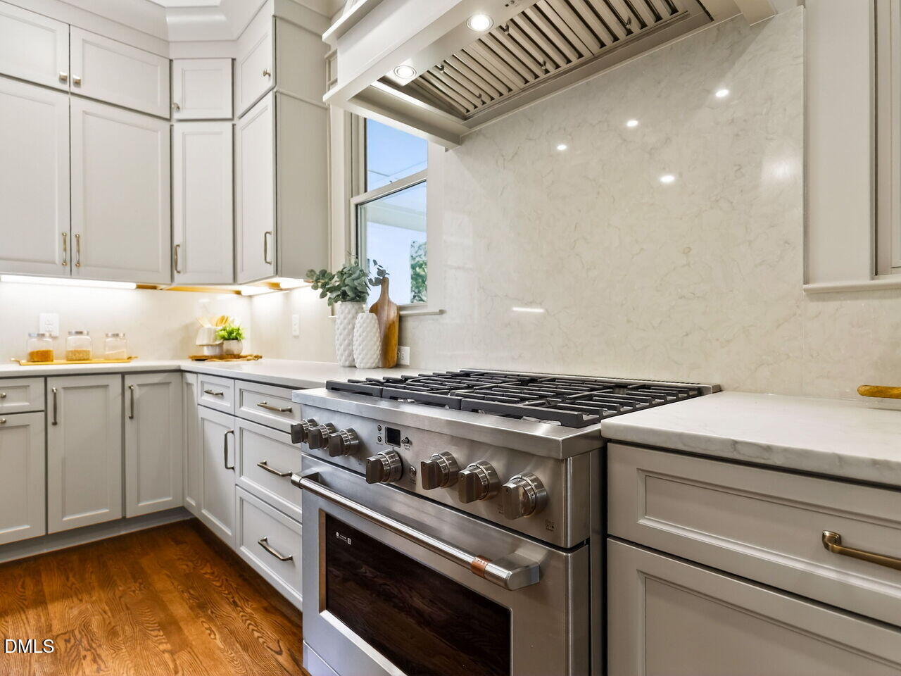 504 Tilden Street Raleigh, NC 27605 - Photo 6 of 58 a stove top oven sitting inside of a kitchen