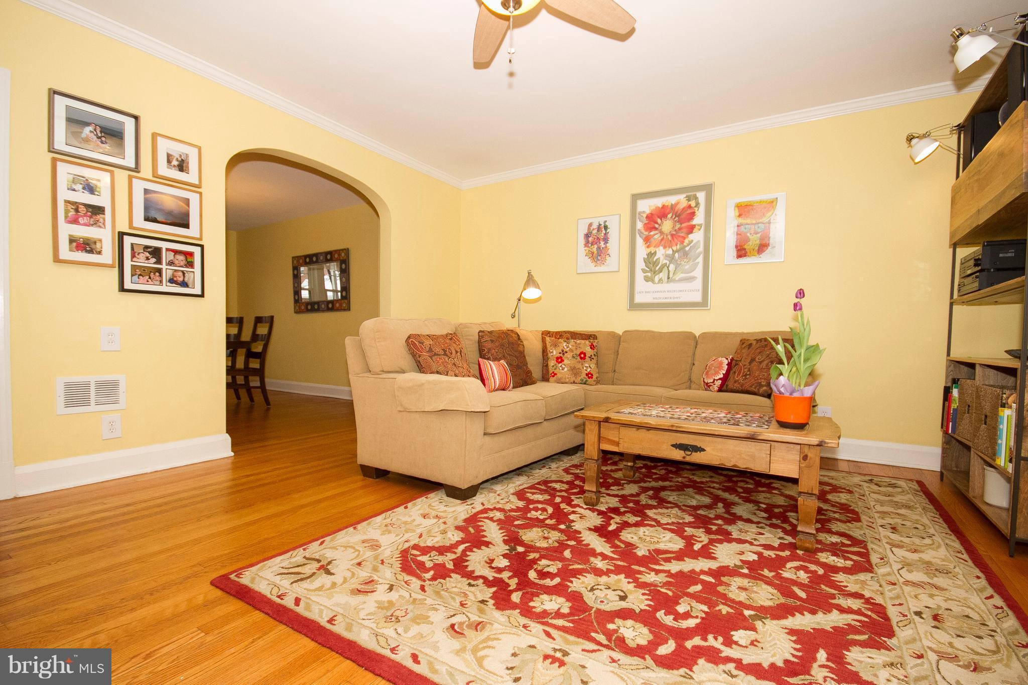 326 Murdock Road Baltimore, MD 21212 - Photo 3 of 29 a living room with furniture and a rug