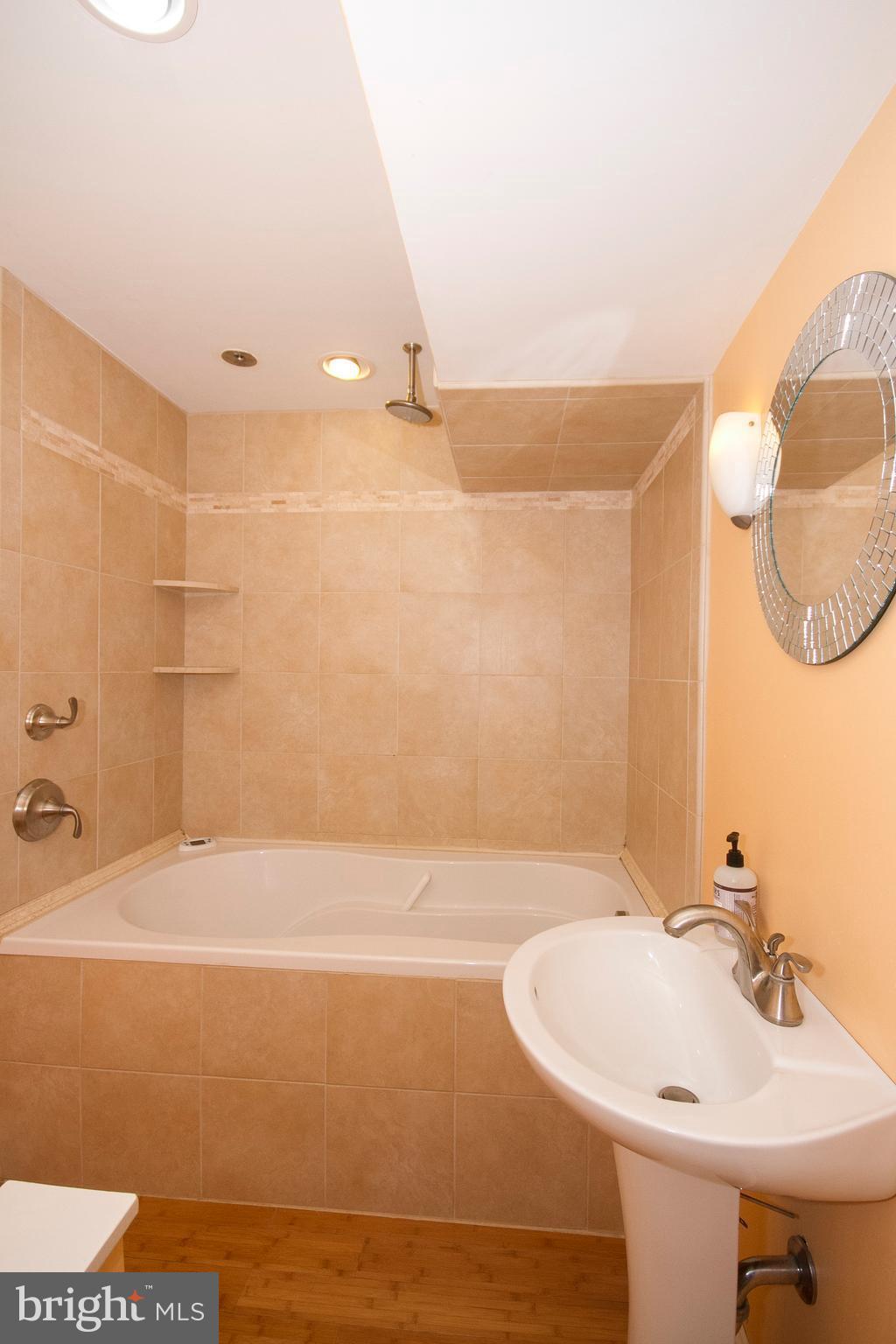 326 Murdock Road Baltimore, MD 21212 - Photo 24 of 29 a bathroom with a sink and a mirror