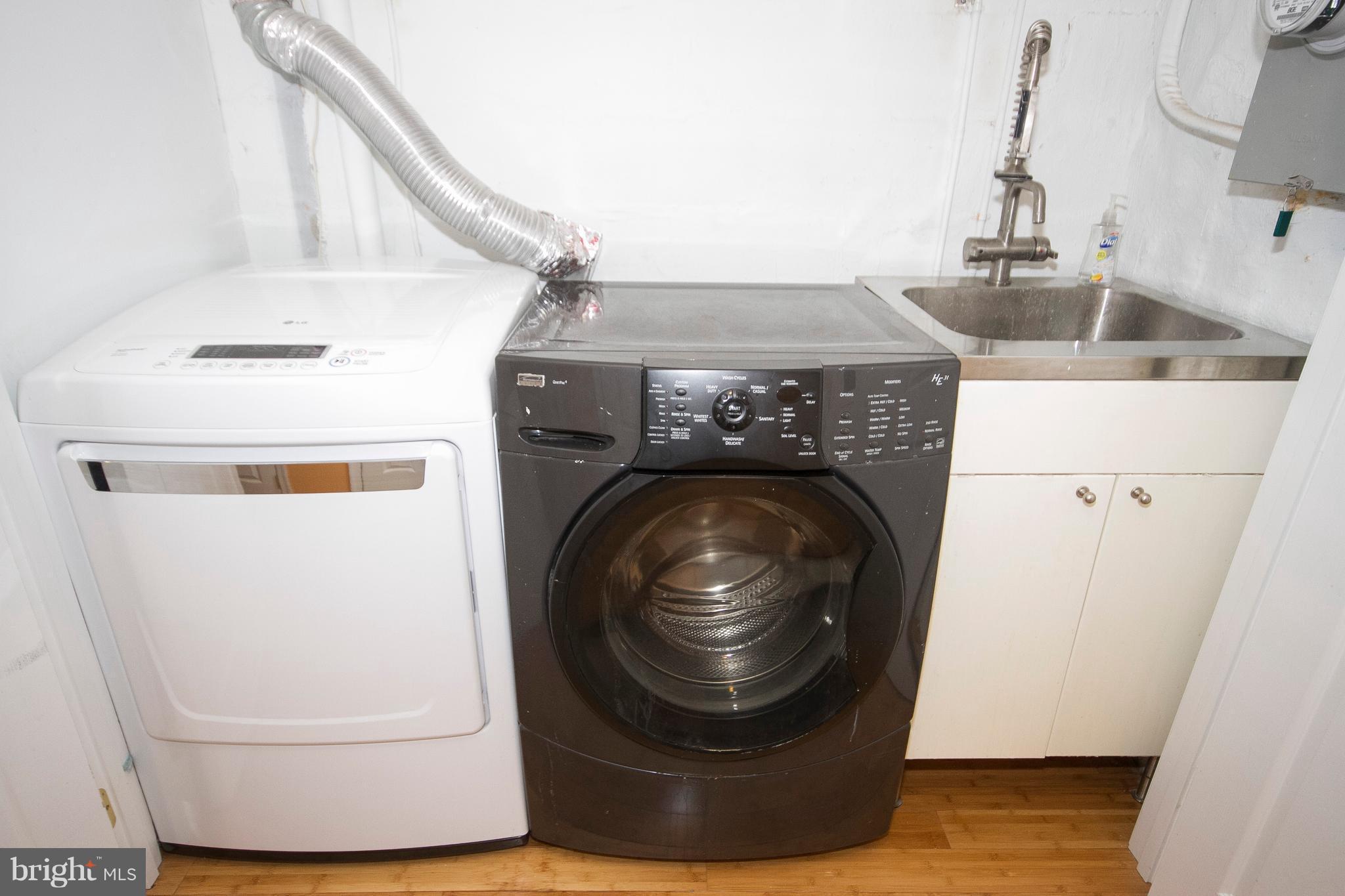 326 Murdock Road Baltimore, MD 21212 - Photo 26 of 29 a utility room with a sink dryer and washer