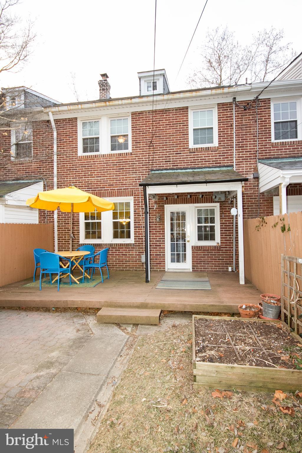 326 Murdock Road Baltimore, MD 21212 - Photo 29 of 29 a view of a brick house with many windows next to a road