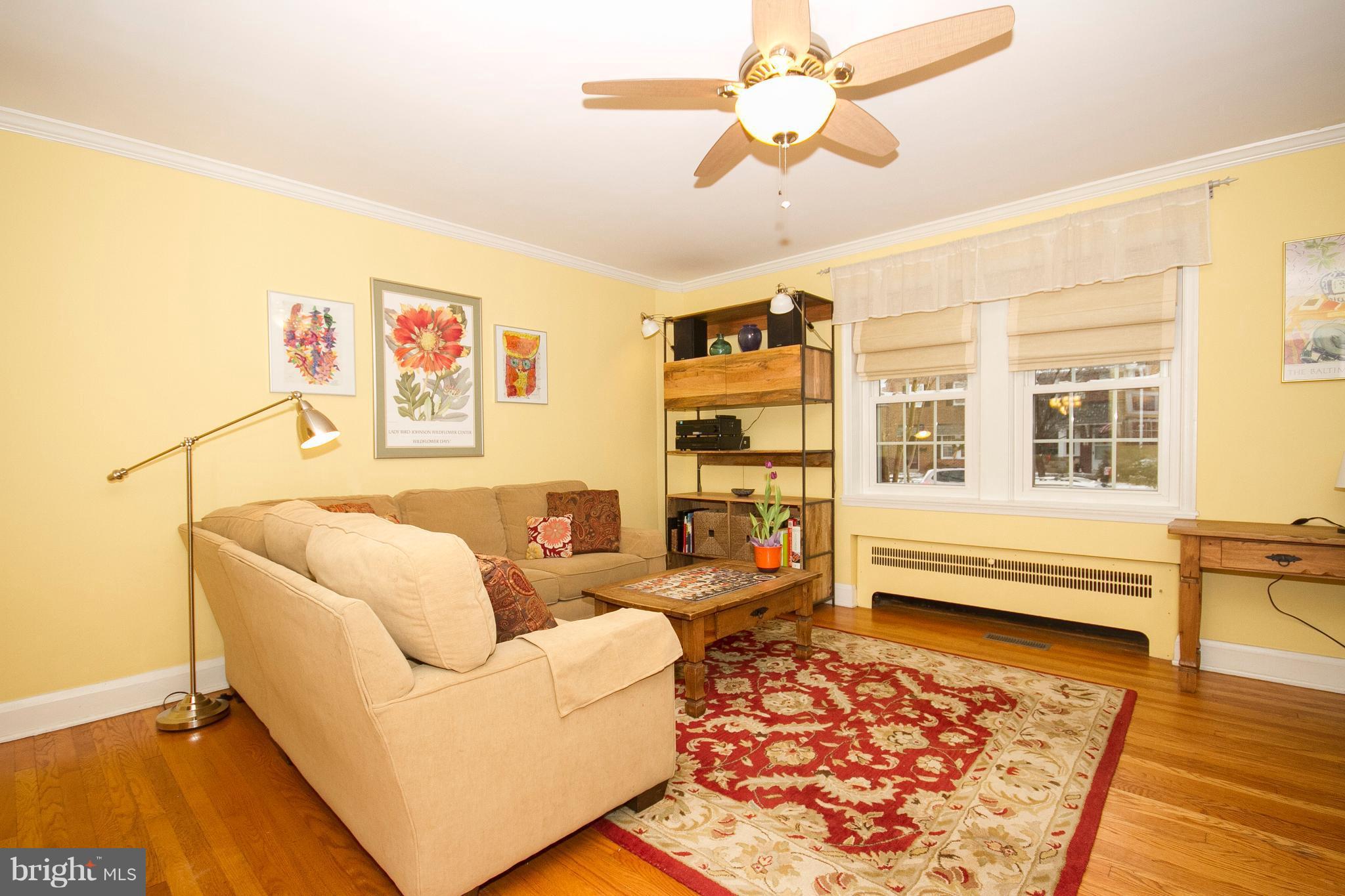 326 Murdock Road Baltimore, MD 21212 - Photo 4 of 29 a living room with furniture and a rug