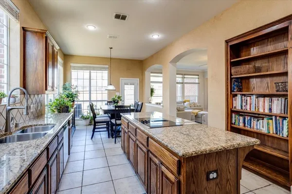 a kitchen with granite countertop lots of counter top space