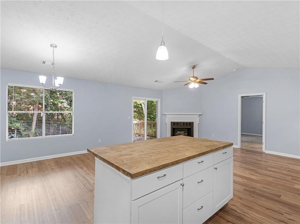1540 Foxhall Lane Atlanta, GA 30316 - Photo 12 of 25 a kitchen with a stove and chandelier