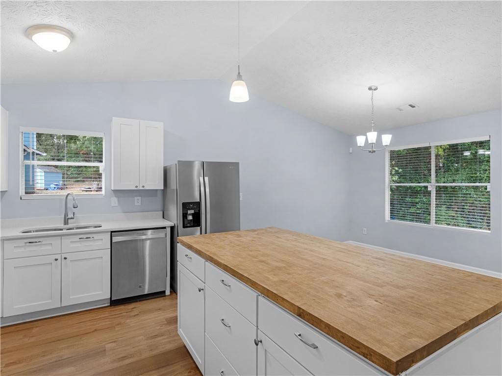 1540 Foxhall Lane Atlanta, GA 30316 - Photo 15 of 25 a view of a kitchen with a sink cabinet and a window