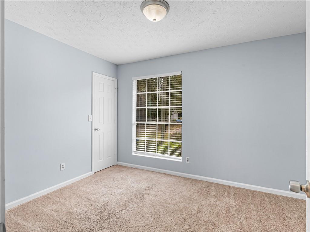 1540 Foxhall Lane Atlanta, GA 30316 - Photo 18 of 25 a view of an empty room with a window