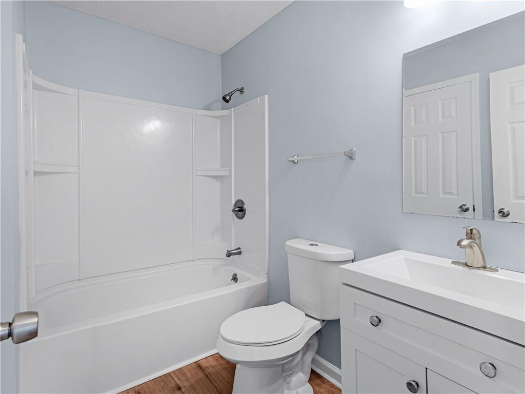 1540 Foxhall Lane Atlanta, GA 30316 - Photo 20 of 25 a bathroom with a sink a toilet and shower