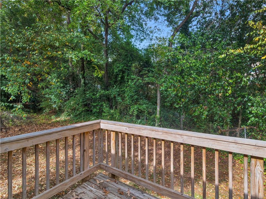 1540 Foxhall Lane Atlanta, GA 30316 - Photo 23 of 25 a balcony with wooden floor and fence