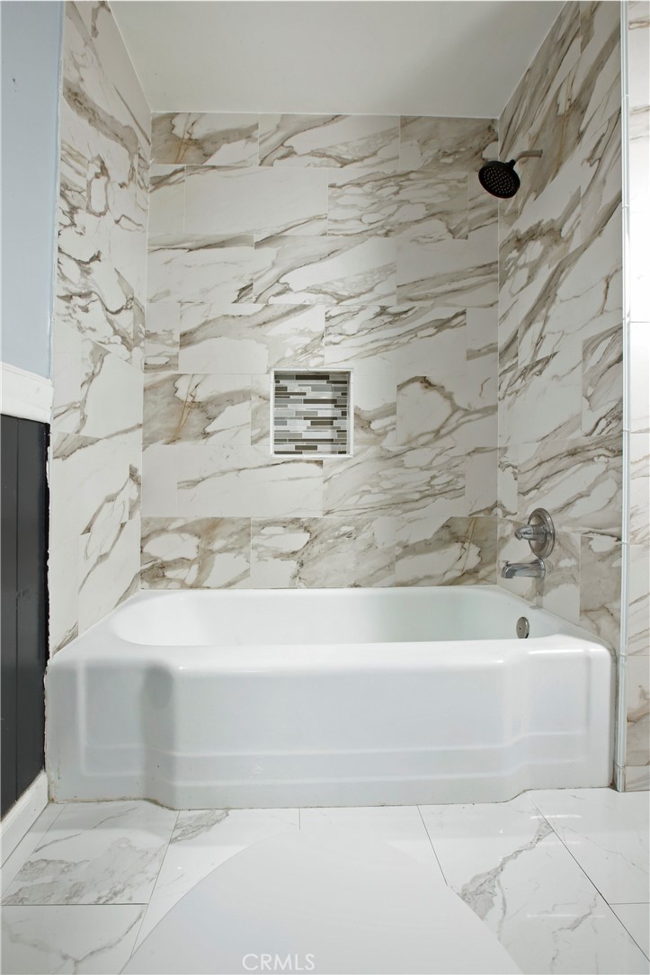 7339 Baird Avenue Reseda, CA 91335 - Photo 13 of 22 a bathroom with a shower