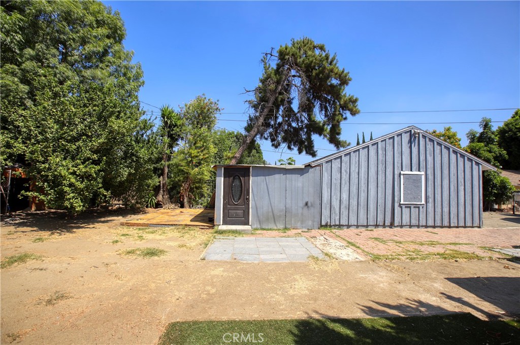 7339 Baird Avenue Reseda, CA 91335 - Photo 19 of 22 a house with trees in the background