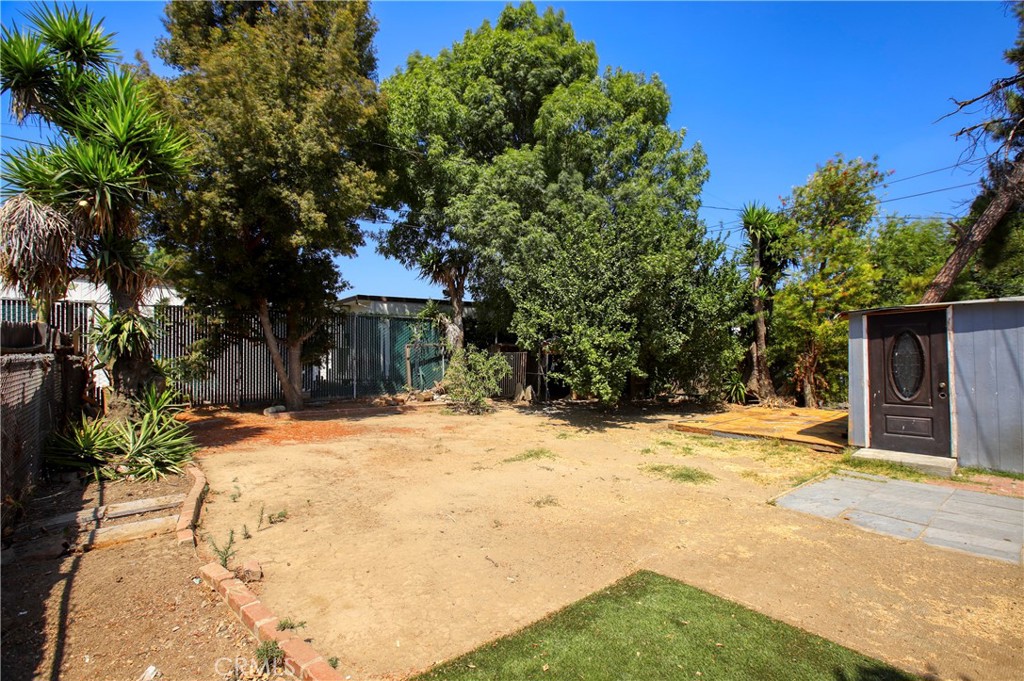 7339 Baird Avenue Reseda, CA 91335 - Photo 22 of 22 a view of a yard with plants and trees
