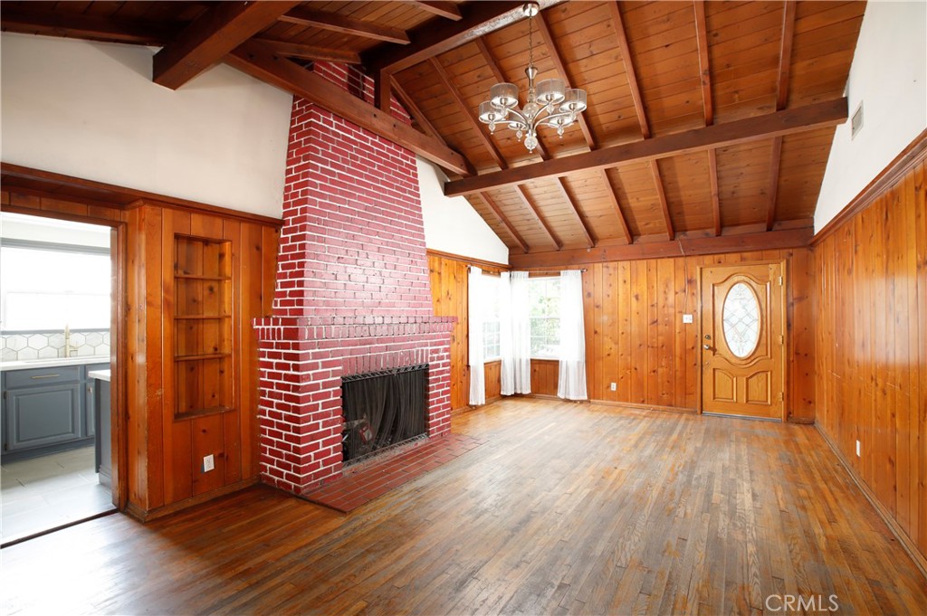 7339 Baird Avenue Reseda, CA 91335 - Photo 5 of 22 a view of empty room with wooden floor and fan