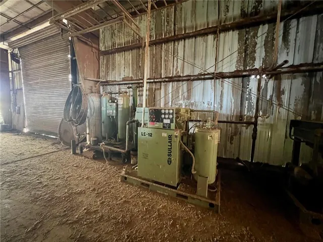 a view of a storage room with wooden floor