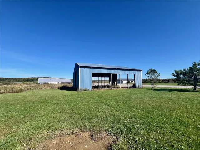 a house view with a garden space