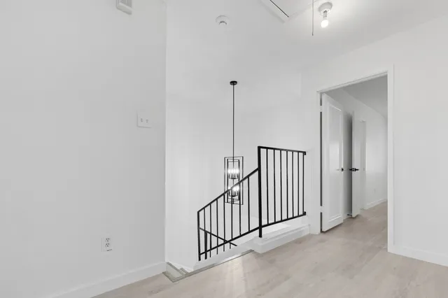 a view of a hallway with closet