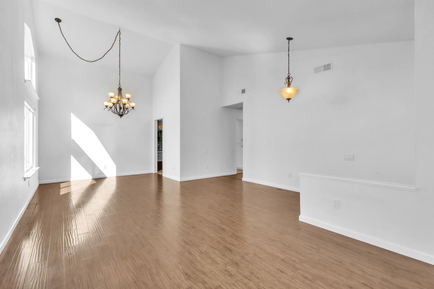 136 Rambling Drive Folsom, CA 95630 - Photo 11 of 31 a view of a room with wooden floor and staircase