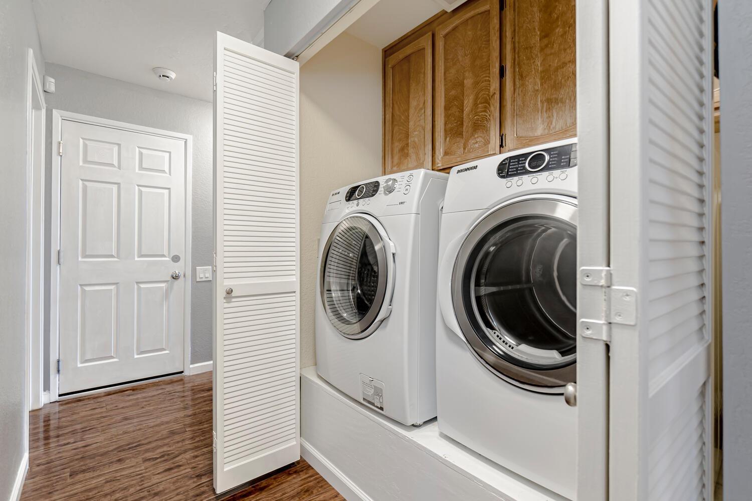 136 Rambling Drive Folsom, CA 95630 - Photo 17 of 31 a utility room with dryer and washer