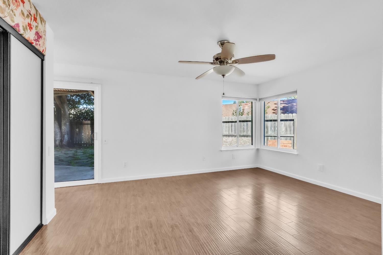 136 Rambling Drive Folsom, CA 95630 - Photo 19 of 31 a view of room window and wooden floor