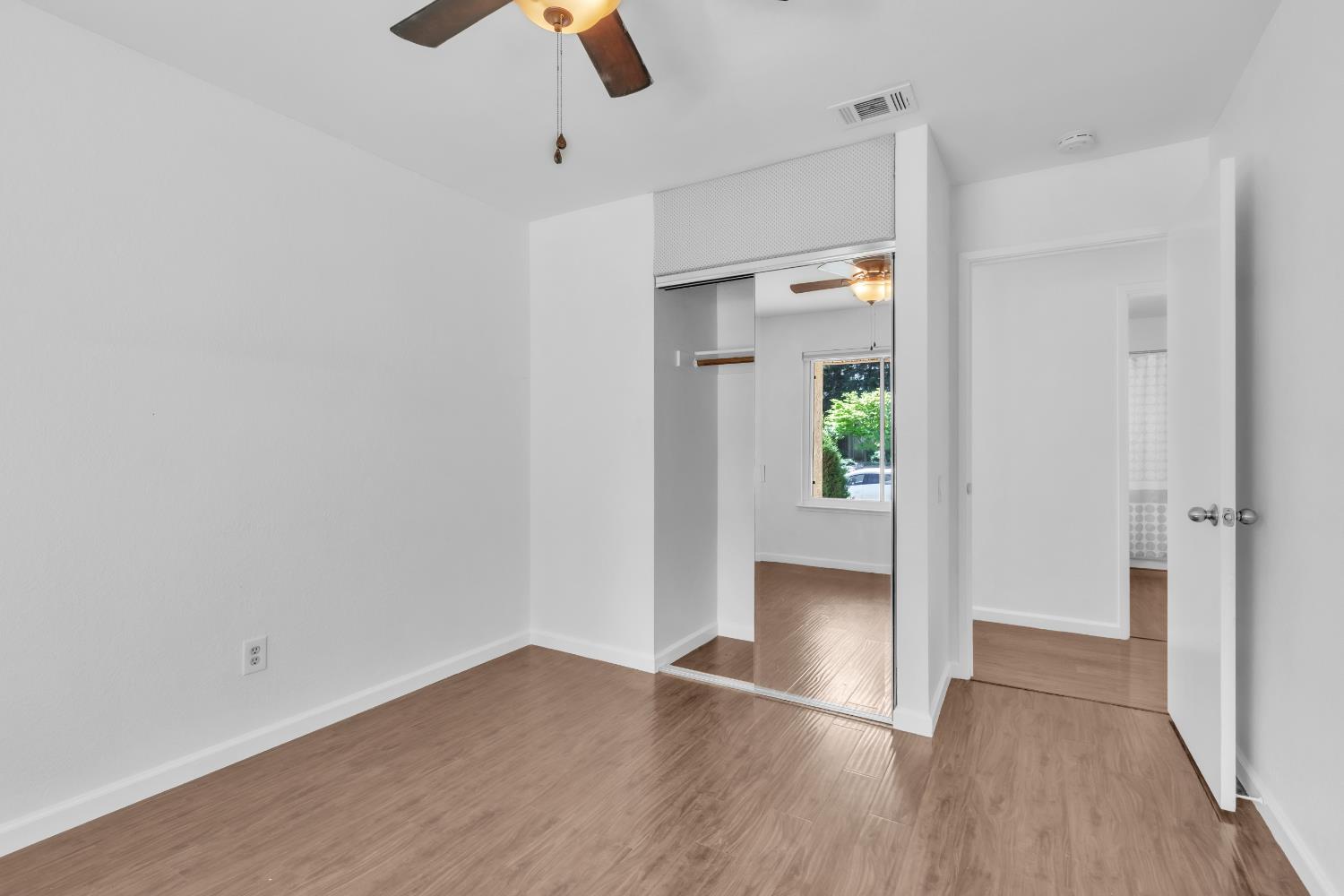 136 Rambling Drive Folsom, CA 95630 - Photo 20 of 31 wooden floor in an empty room with a window